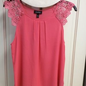 Pretty coral colored sleeveless blouse